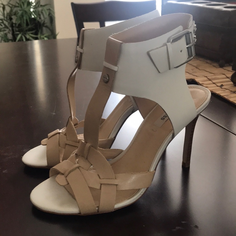 White and tan leather Guess heels.
